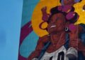 Angurria: el muralista dominicano que llevó la mujer en rolos al Bronx